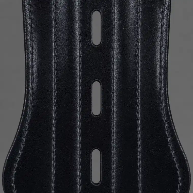 The three vent slots running down the face of the arm guard