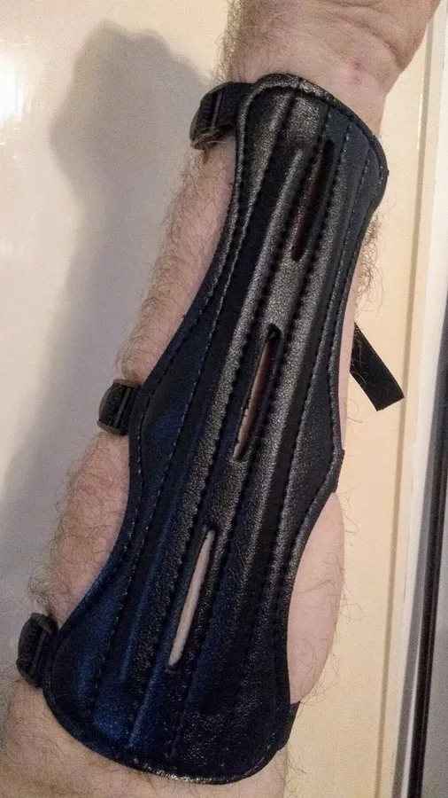 Arm guard worn on a forearm, photographed by a verified buyer