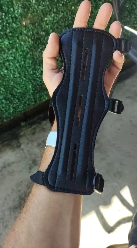 Arm guard fitted on a forearm outdoors, photographed by a verified buyer